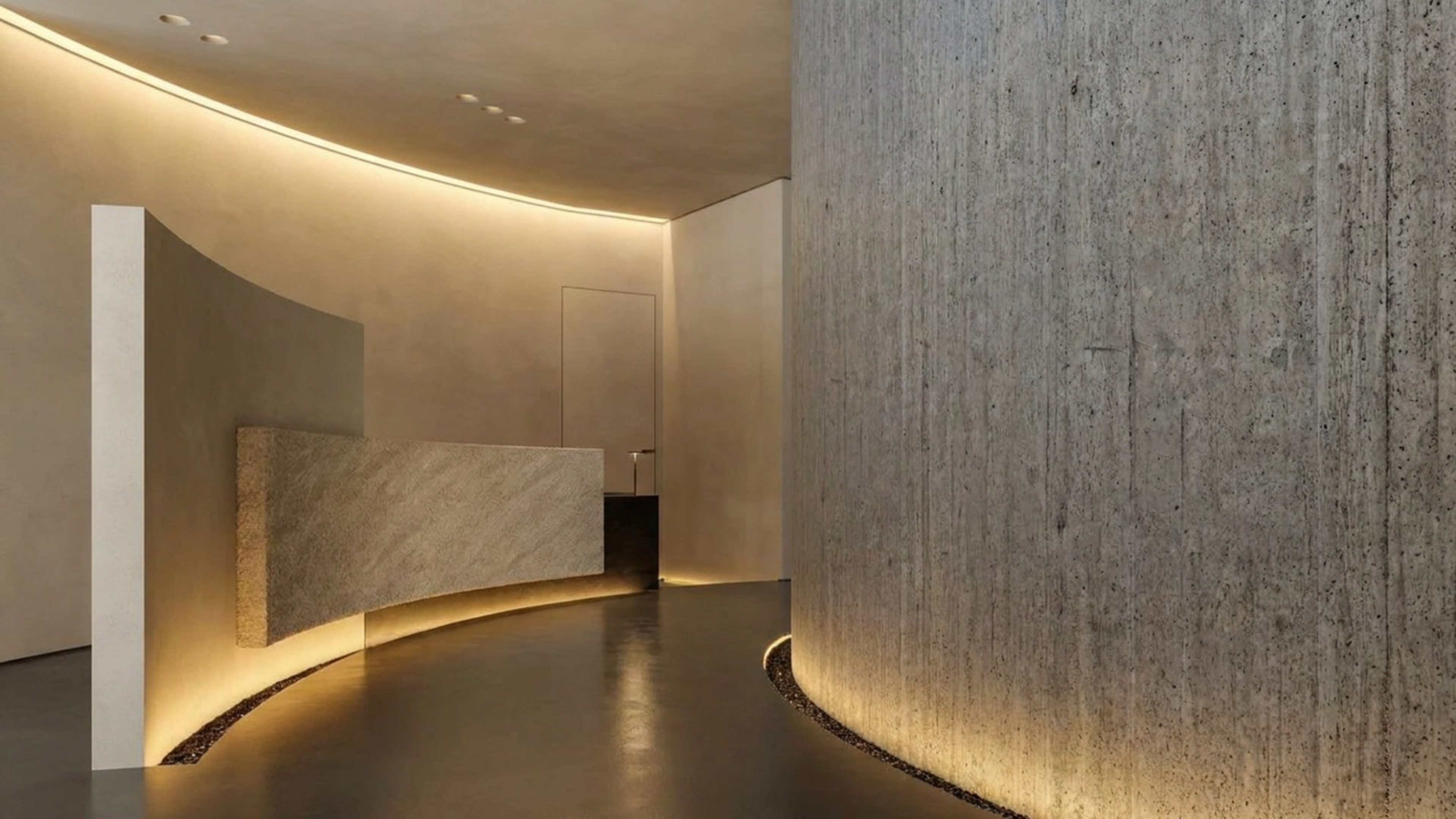 LUX VIDA showroom interior — curved stone walls with ambient lighting